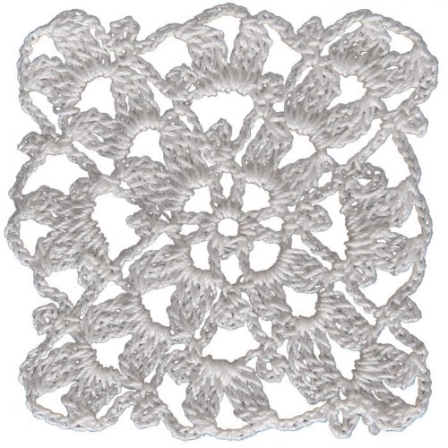 In the middle part of the model, a flower motif is crocheted. The model is designed as a square with the grouped texture embelisments around the flower motif.