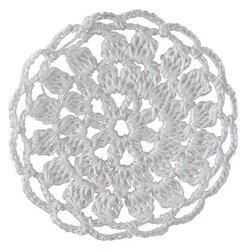 Crocheted as a round form, the model is ornamented with thin slices.