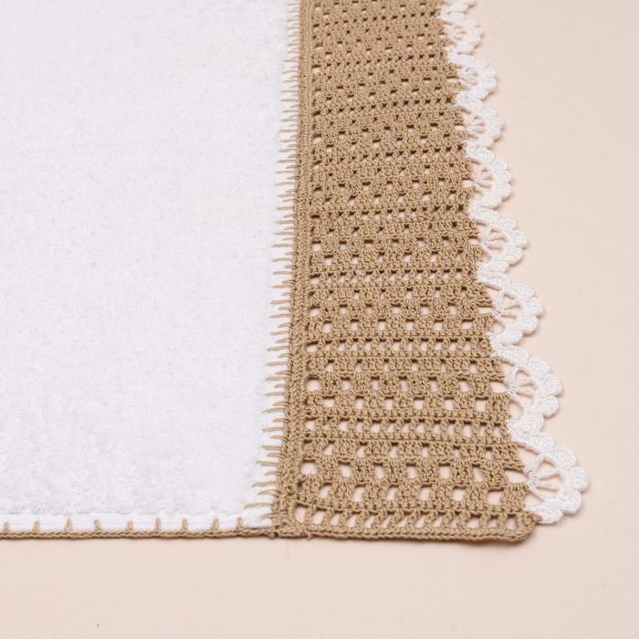 Guest Towel is crocheted with a stairway motif style. The edges of the crochet and all the edges of the towel is crocheted with a edging work.