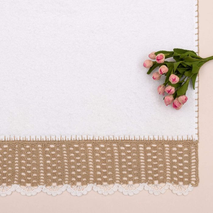Guest Towel is crocheted with a stairway motif style. The edges of the crochet and all the edges of the towel is crocheted with a edging work.