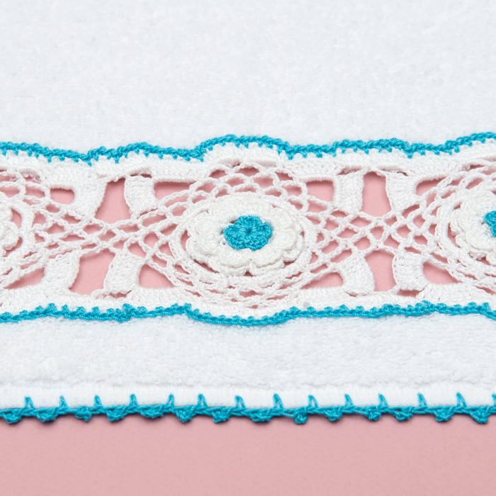 Hand Towel With White Crochet Motif and Turquoise Flowers Detail Angle Shot
