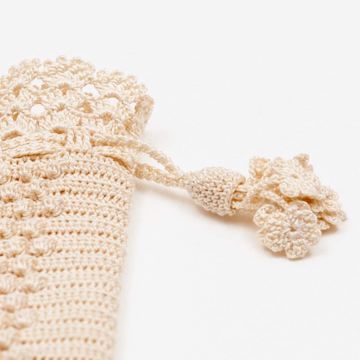 Crochet Eyeglass Pouch With Embossed Crochet Pattern Textured Body Tassel Detail Shot