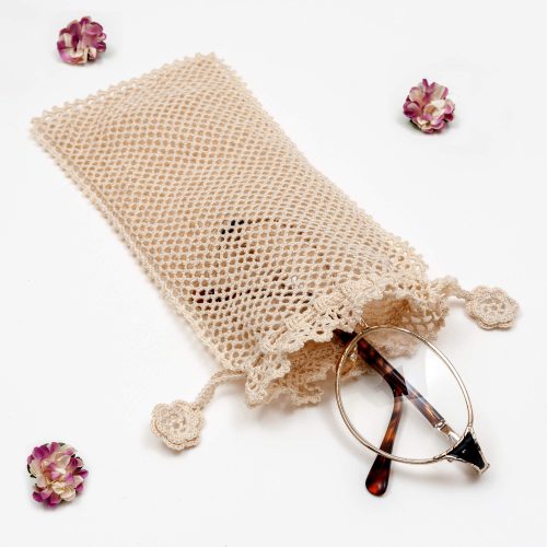 Crochet Soft Drawstring Style Sunglass Pouch With Dotted Textured Angle Shot,