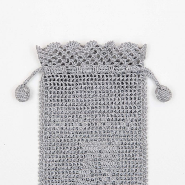 Gray Case With Personalized Crochet Monogram Upper Body Detail Shot