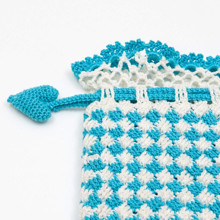 Crochet Case With Braided Knot Texture Body Tassel Detail Shot