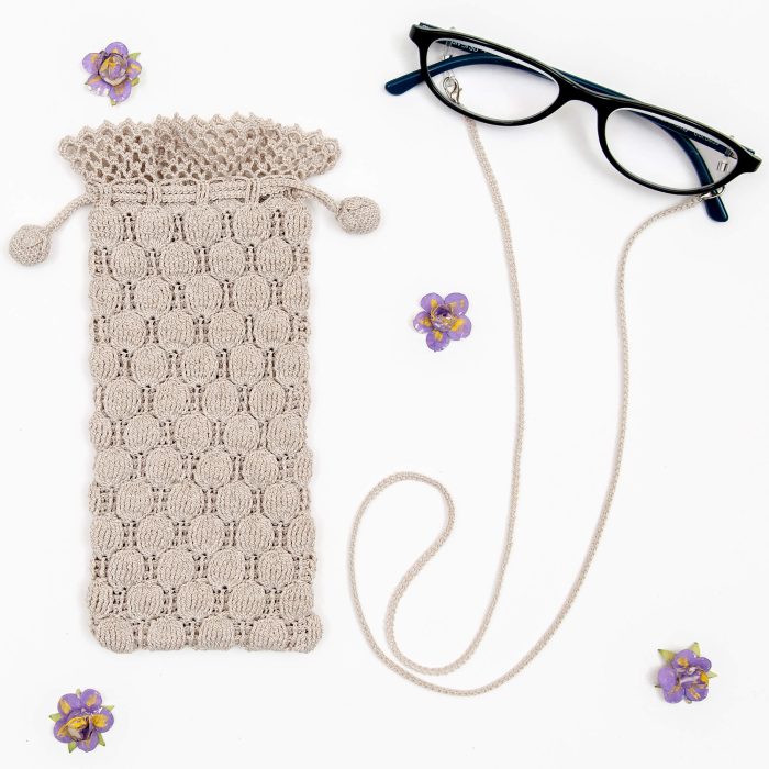 Crochet Case With Embossed Body Glass Strap Set Top Shot On Glass