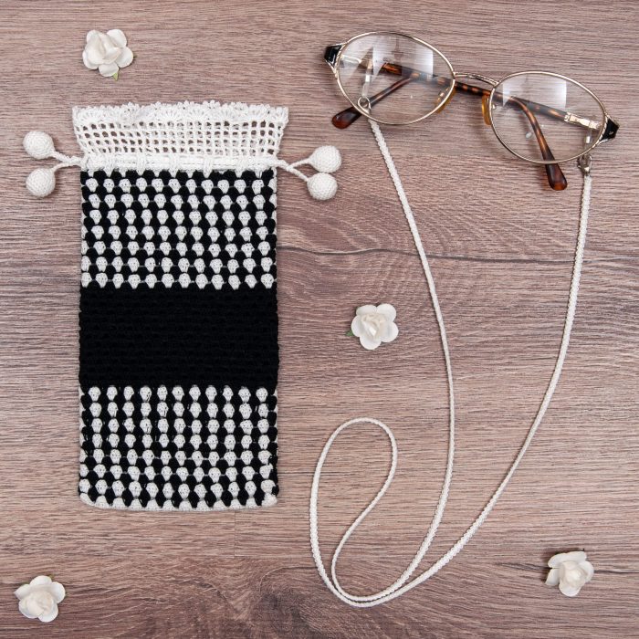 Handmade Crocheted Bicolor Case With Spotted Textured Body And Twin Tassel and Eye Glass Set Shot