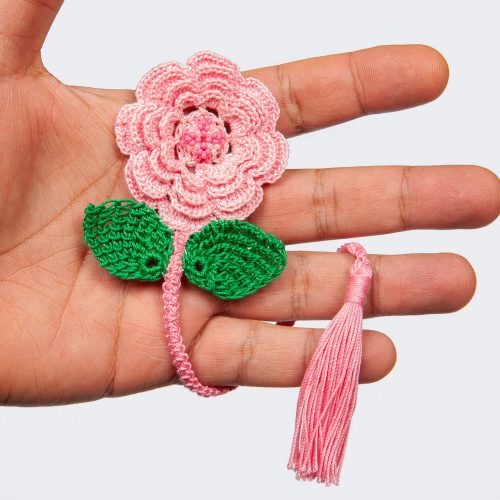Four Layered Pink Crochet Flower Bookmark Hand Shot