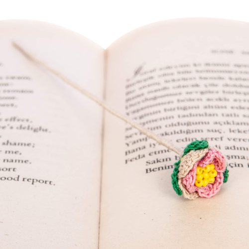 Micro Crochet Floral Handmade Bookmark With Yellow and Pink Leaves Book Angle Close Shot