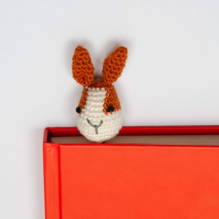 Crochet Amigurumi Bunny Plushie Bookmark Accessory on Table Close Shot