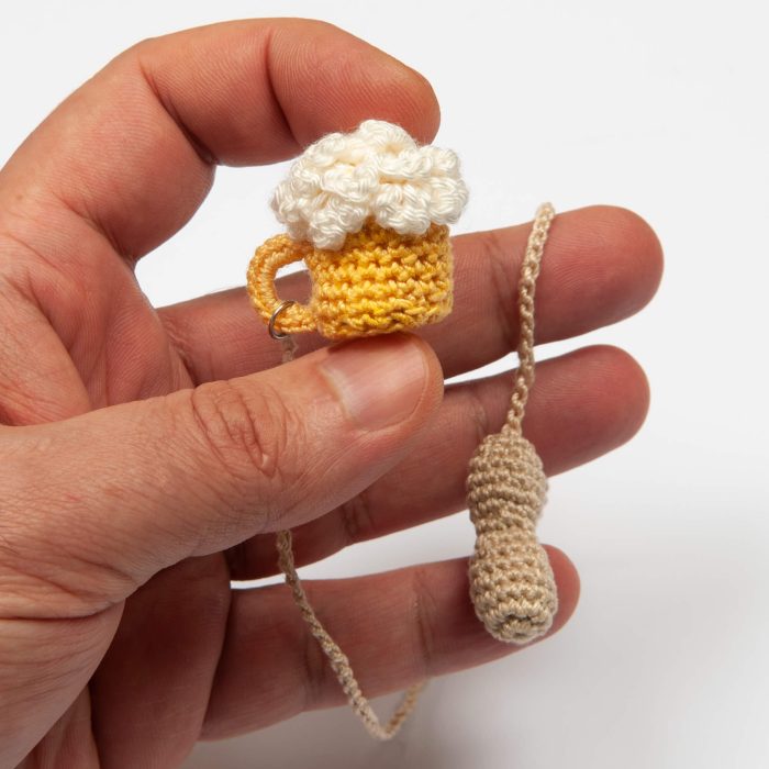 Crochet Handmade Beer Glass With Crochet Peanut Tassel Glass Detail Hand Shot