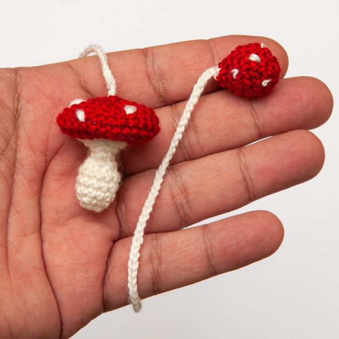 Cute Crocheted Red Mushroom Bookmark Gift On hand Shot