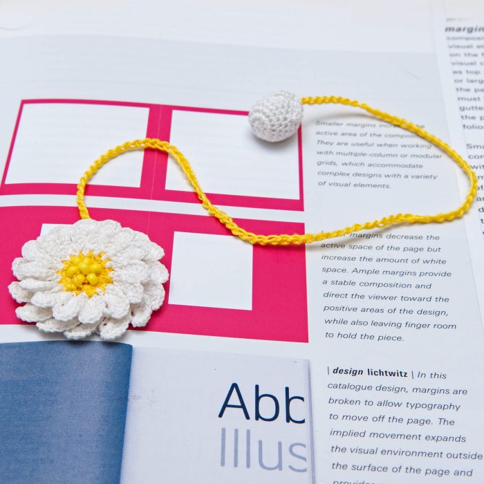 Delicate and Artistic Two-Layered Handmade Micro Crocheted Beaded Daisy Bookmark with Tassel On Book Shot