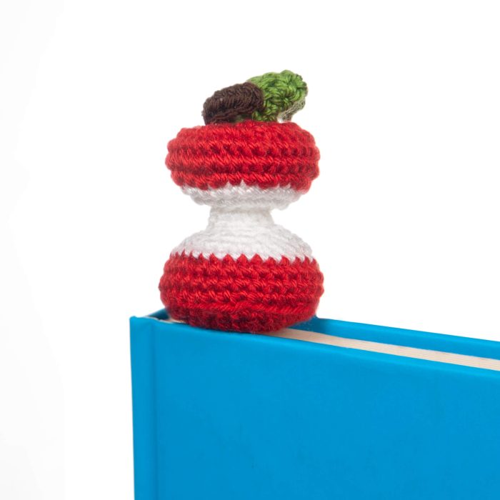 Handmade Amigurumi Crocheted Eaten Apple Bookmark With Tassel Book Angle Shot
