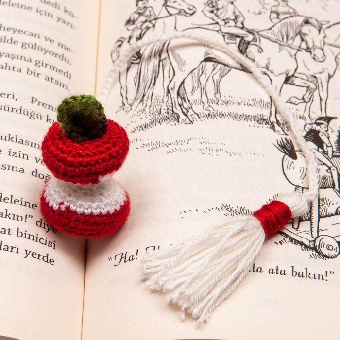 Handmade Amigurumi Crocheted Eaten Apple Bookmark With Tassel On Book shot