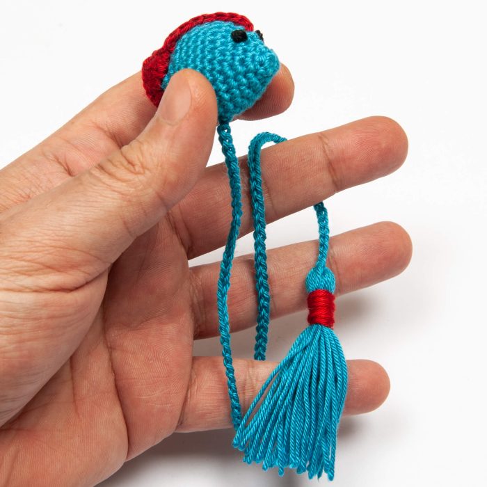 Handmade Blue Crochet Amigurumi Fish Bookmark Soft Toy Hand Angle Shot