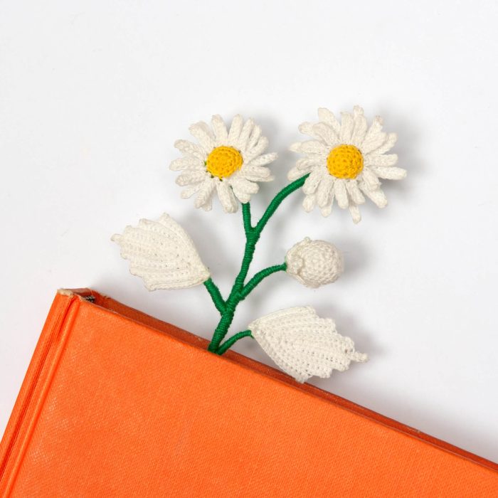 Micro Crochet White Daisy With Leaves Floral Bookmark Vintage Gift For Mother's Day On Desk Angle Shot